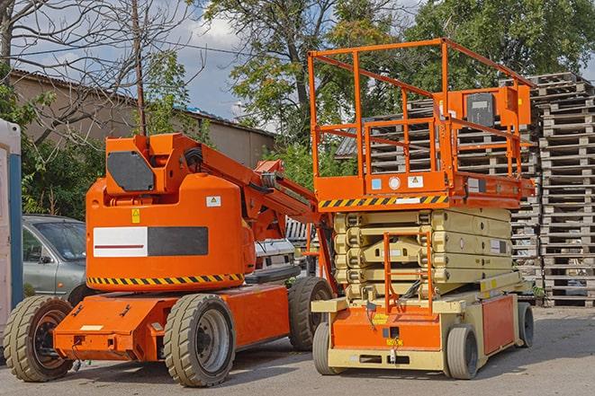 industrial forklift navigating through packed warehouse shelves in Coeymans